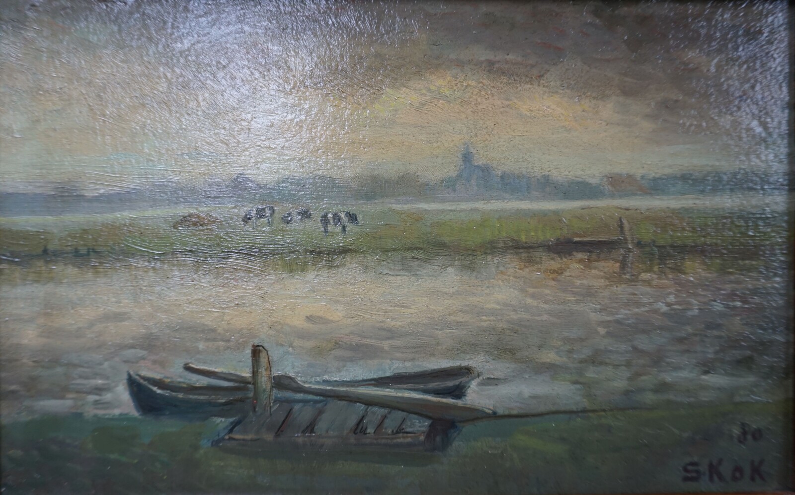 Dutch landscape with boat and cows